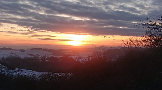 1. Sonnenuntergang - Ausblick von Osterode in Richtung Niedersachswerfen (Foto: Christoph Burkert)