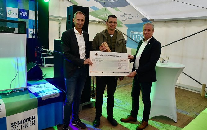 Auszeichnung zum Partner des Jahres: D&ouml;rmann, Pein, Loup (v.l.n.r.) (Foto: WBG)