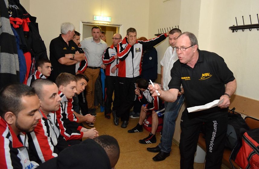 Die Mannschaft und der Trainer