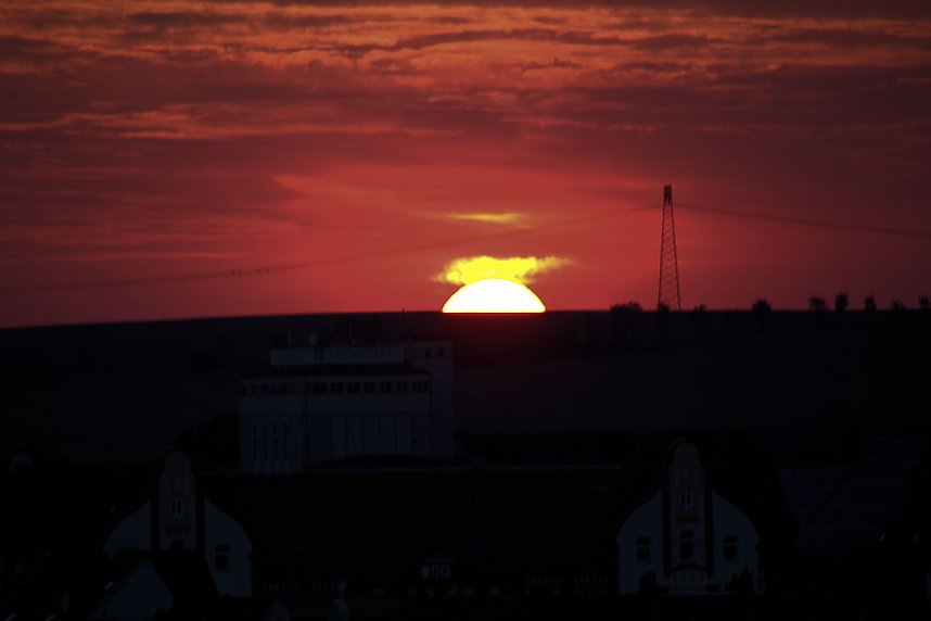 Stadt- und Sonnenansichten