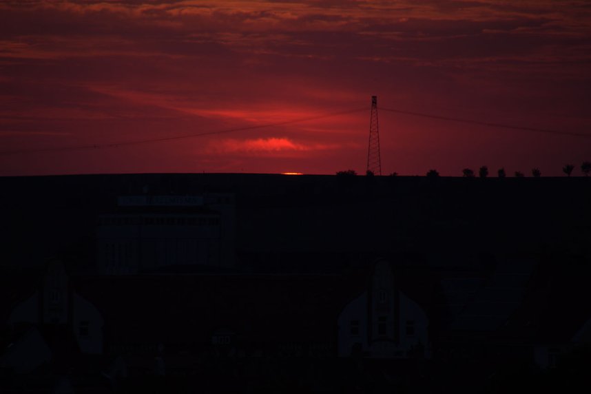 Stadt- und Sonnenansichten